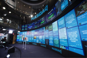 Nasdaq pulls content from a hashtag and displays content on large screens which are rotating UGC 