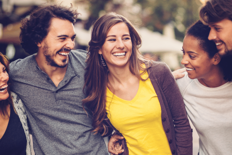 Image of a group of happy people smiling