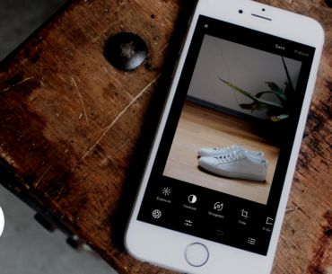 TINT logo next to a phone displaying an image of shoes