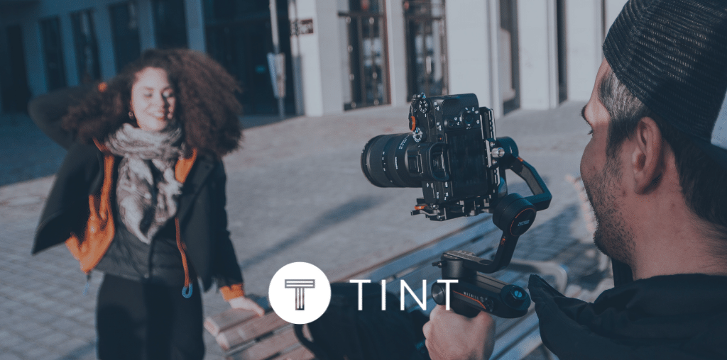 filming video content in an urban center with TINT overlay