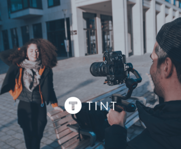 filming video content in an urban center with TINT overlay