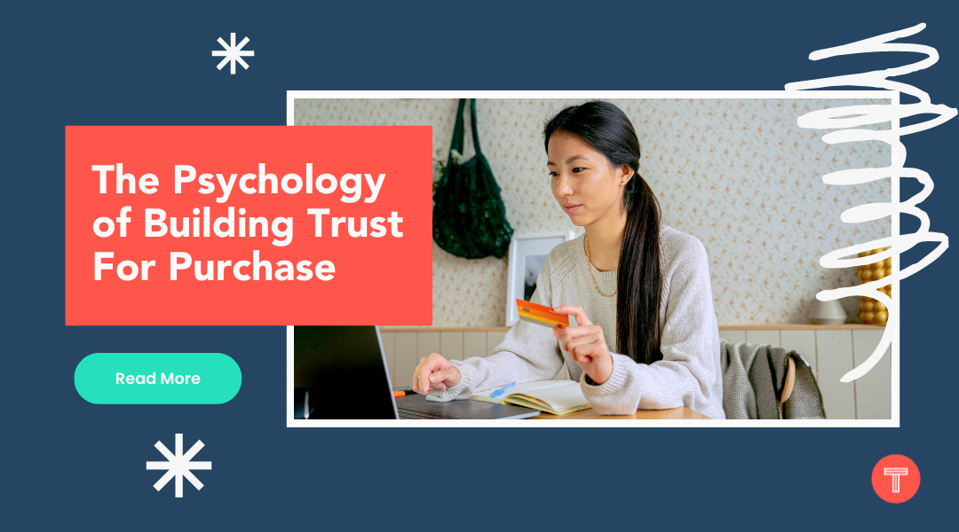 The psychology of building trust for purchase - read more. The banner also features a woman holding her credit card as she looks at her laptop.