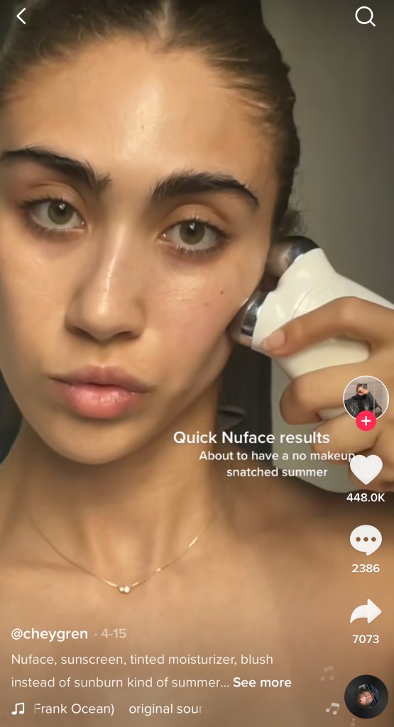 A woman reviewing her NuFace on TikTok 