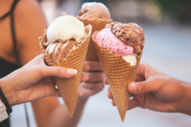 Image of hands holding ice cream cones