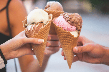 Image of hands holding ice cream cones
