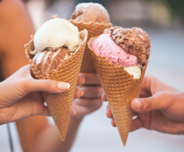 Image of hands holding ice cream cones