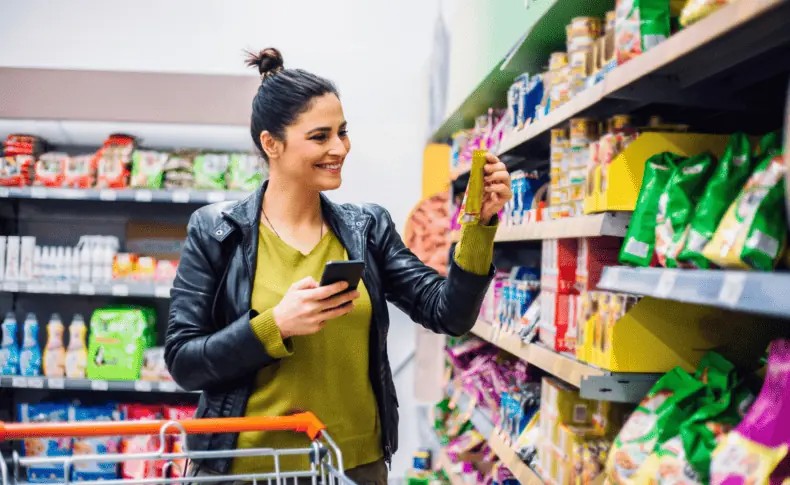 A woman shopping at a grocery store