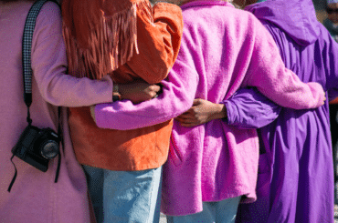 A group of friends hugging