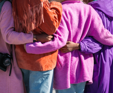 A group of friends hugging