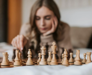 A woman playing chess