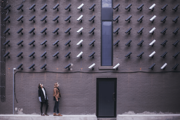 A lot of security cameras pointing down at two women