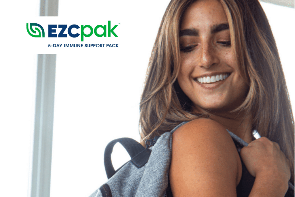Woman with backpack and EZC Pak logo